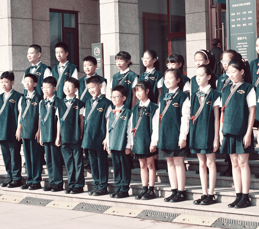 students standing for school assembly